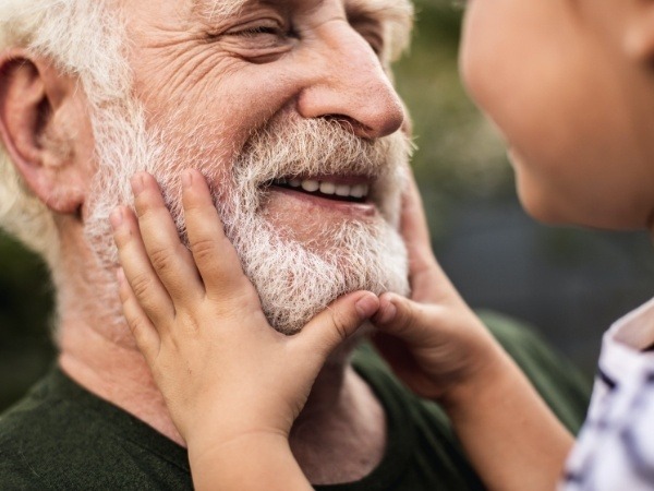 Man enjoying the benefits of dental implants