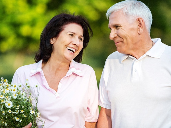 Senior couple smiling with dentures in Brookfield