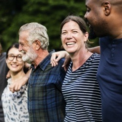 Group of friends smiling together outdoors