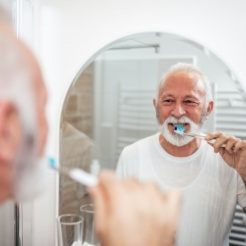 Man brushing teeth