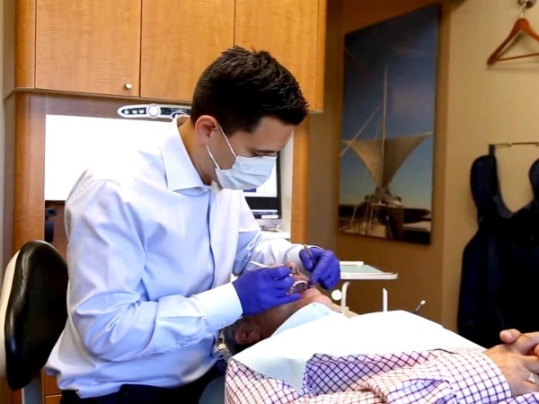 Doctor Taibl treating dental patient