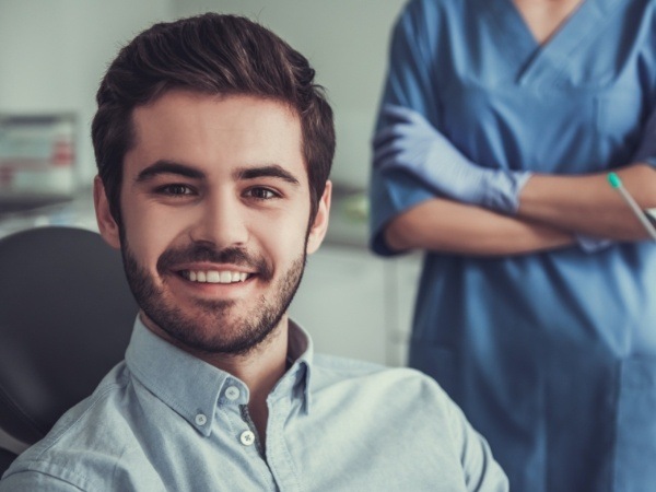 Man smiling after oral cancer screening