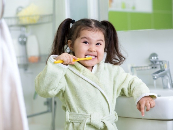 Child brushing teeth