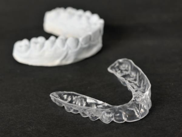 Custom oral appliance for T M J treatment