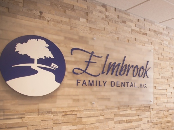 Elmbrook Family Dental logo on wall