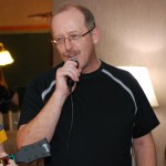 Man singing into a microphone