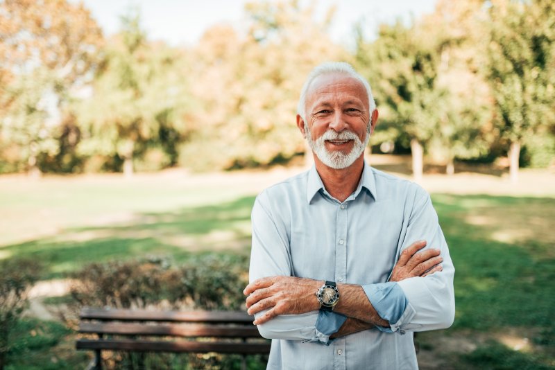 older man with dental implants