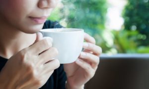 person drinking coffee