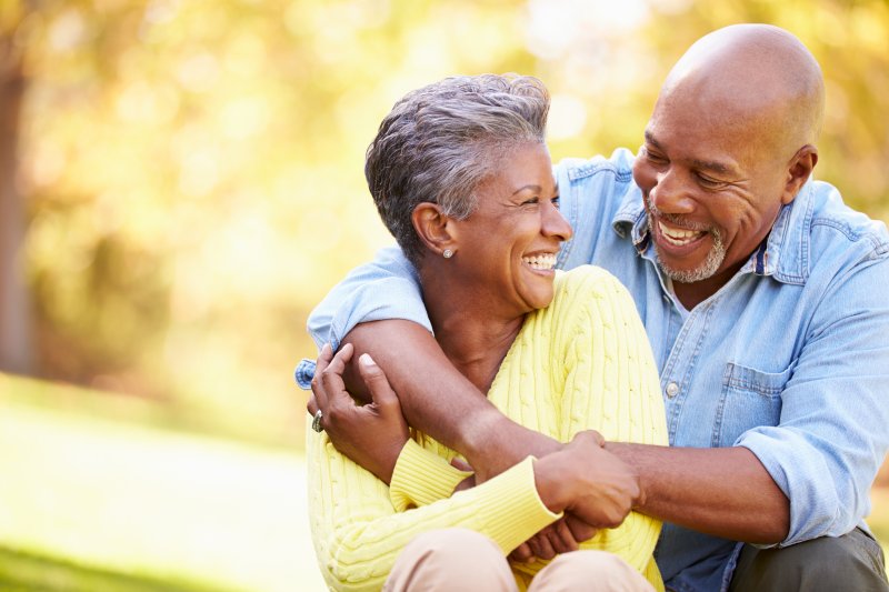 man and woman with dental implants